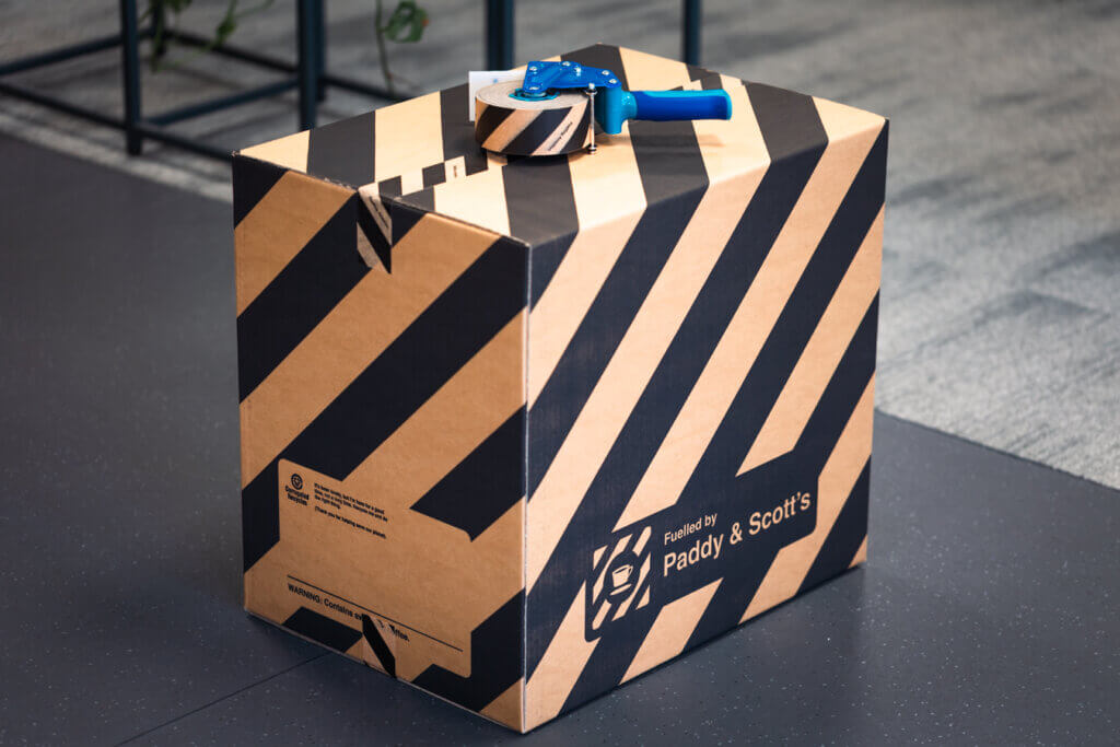 Paddy & Scott's bespoke boxes and printed tape.
